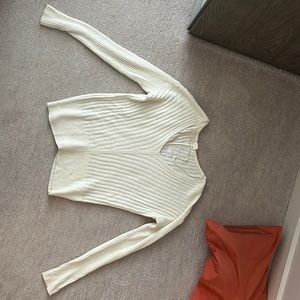 V-neck, cream knit sweater. Fitted, size small